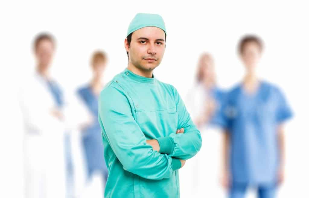 Surgeon in front of his team